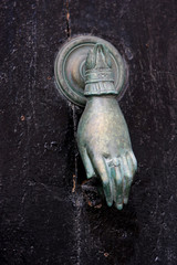 Heurtoir de porte , main