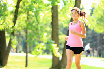 Runner - woman running in park