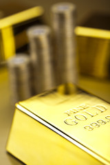 Coins and gold bars, Finance Concept