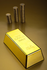 Coins and gold bar, Finance Concept