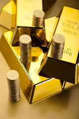 Coins and gold bars, Finance Concept
