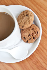 coffee cup with cookie .