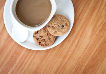 coffee cup with cookie .