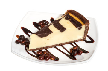 cheesecake with chocolate sauce.