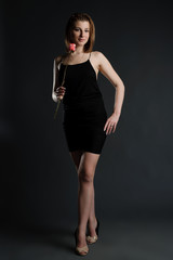 Beautiful girl on a dark background