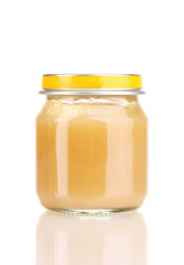 Jar of baby puree isolated on white