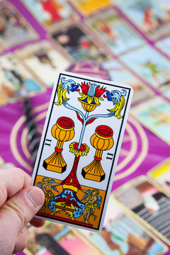 Tarot card held in the hand (2).