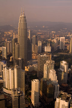 Petronas Twin Towers and the city centre at sunset © tuomaslehtinen
