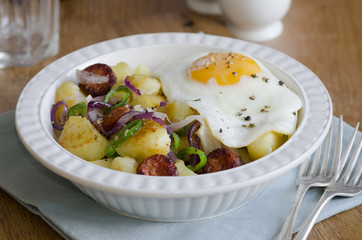 Fried egg, chorizo and potatoes
