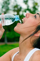 Girl Drinking water looking up