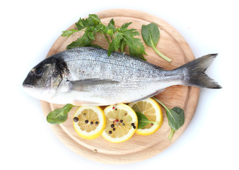 Fresh fish with lemon, parsley and spice