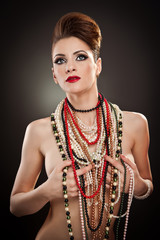 young beautiful woman with beads and jewelry