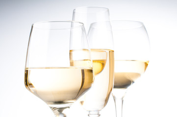 Three glasses of white wine