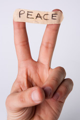 peace two fingers bandage