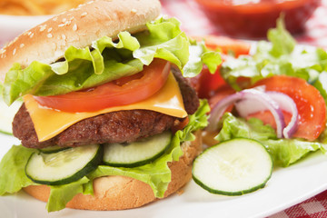 Classic hamburger with cheese, tomato and lettuce