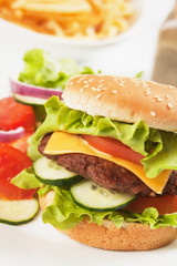 Classic hamburger with cheese, tomato and lettuce