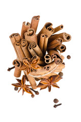 Cinnamon and anise on isolated white background