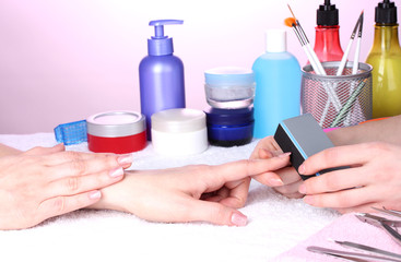 Manicure process in beautiful salon