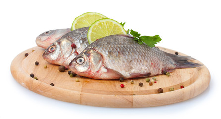Fresh fishes with lime, parsley and spice
