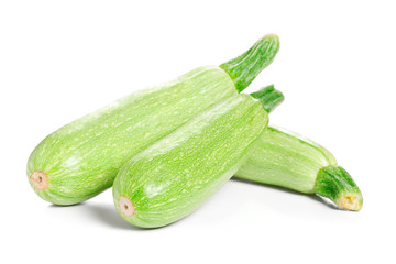 Green fresh Zucchini isolated on white background