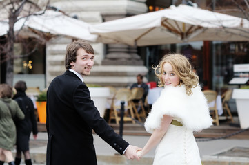 Naklejka premium Bride and groom walking together