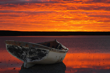 Boat against sunset montage