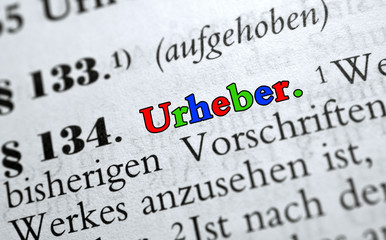 Urheber - Text mit farbigen Buchstaben