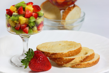 Bread with fresh kiwi, strawberry, pineapple