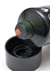 black tube of cosmetic cream
