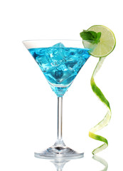 Blue cocktail in martini glasses with ice isolated on white