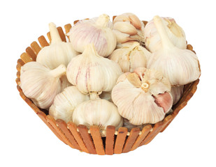 garlic in basket isolated on white background