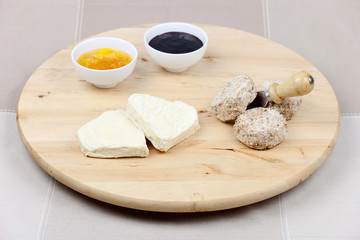 Goat cheese heart shaped and covered with sesame seeds