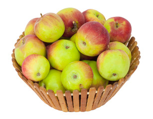 ripe apples in basket on a white background