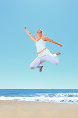 young beautiful woman jumping