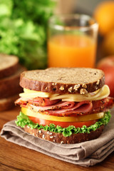 A fresh deli sandwich with tomatoes