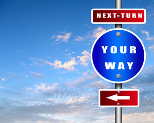 Road sign agaisnt blue sky