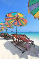 Beach chair and colorful umbrella on the beach , Phuket Thailand