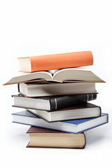 A stack of books on a white background.
