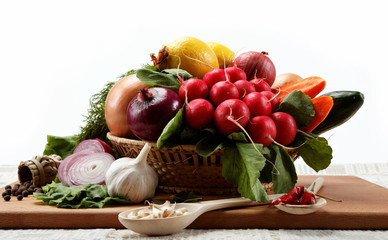 Healthy food. Fresh vegetables and fruits on a white background.