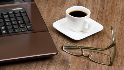 Fototapeta na wymiar Espresso coffee with laptop