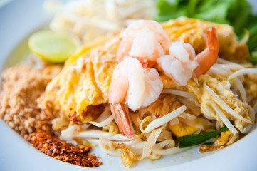 Stir-fried rice noodles with egg and shrimp (Pad Thai)