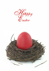 Easter card with a red egg in the nest