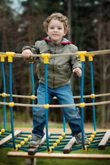 A little boy in the playground