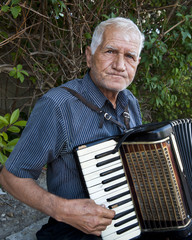 Old Man with Accordian