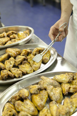 Cook with a tray of food