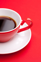 Black coffee in a porcelain dish