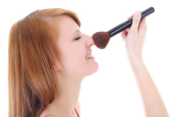 Happy teenager with make-up brush