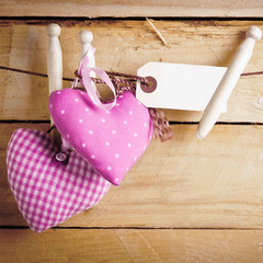 Romantic textile hearts with blank label