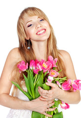 Picture of happy young blonde woman with colorful flowers
