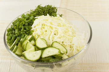 early cabbage salad with cucumbers and green onions